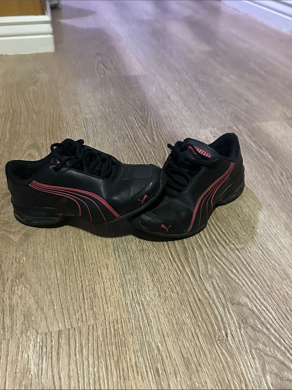 Puma women’s Black Trainers with Pink Trim